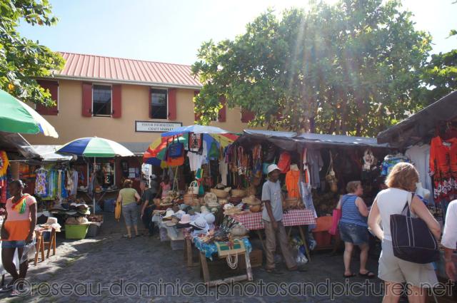 Tourists shop at the Craft Market in Roseau Dominica.jpg