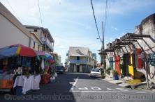 Colorful doors and vendor stands in Roseau Dominica.jpg