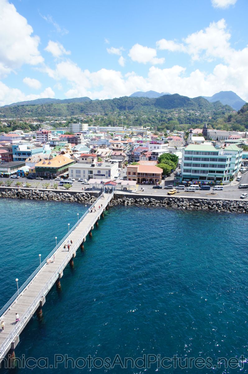 Cruise ship long pier in Roseau Dominica.jpg