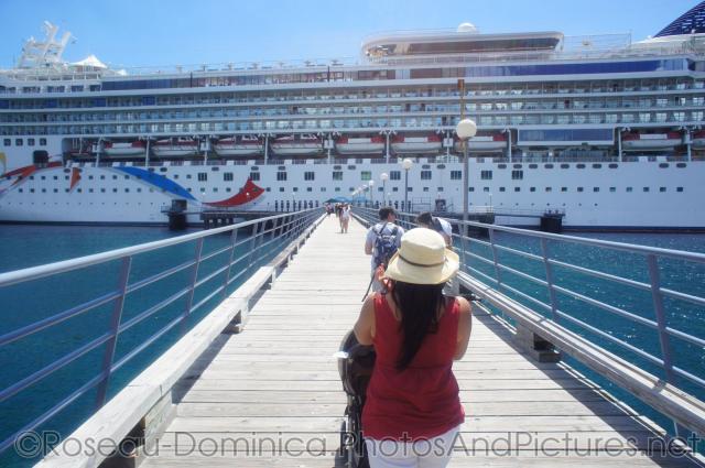 Walking on pier back to Norwegian Dawn docked at Roseau Dominica.jpg
