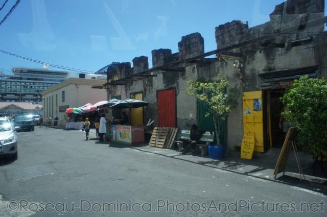 Vendors and juicestands in Roseau Dominica cruise port area.jpg