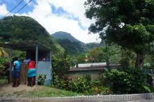 People of Roseau Dominica at a small vending shack in the hills of Roseau Dominica.jpg