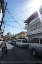 Vans and cars parked on street in downtown Roseau Dominica.jpg